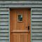Oak stable door with aperture